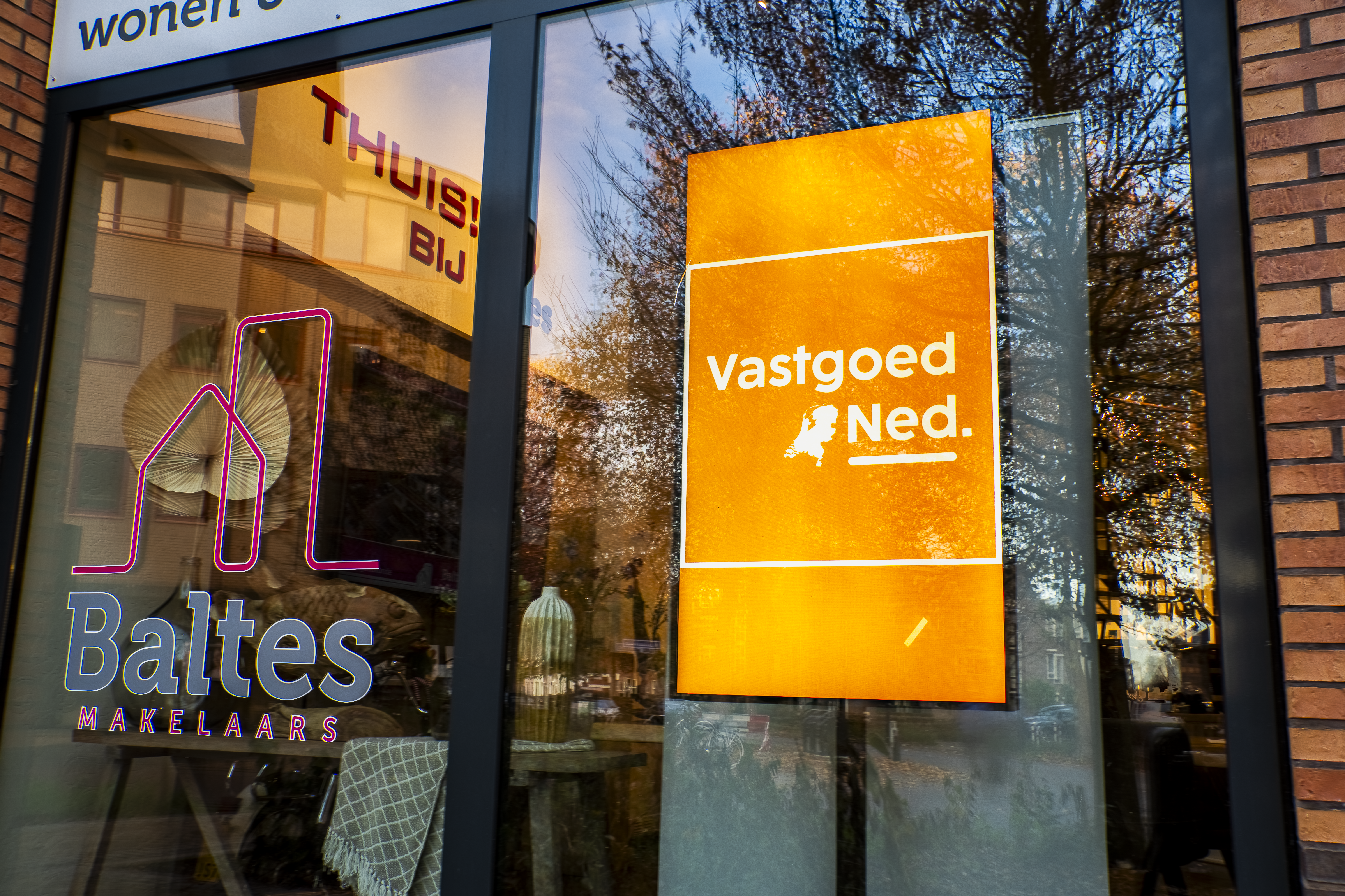 Makelaars narrowcasting scherm